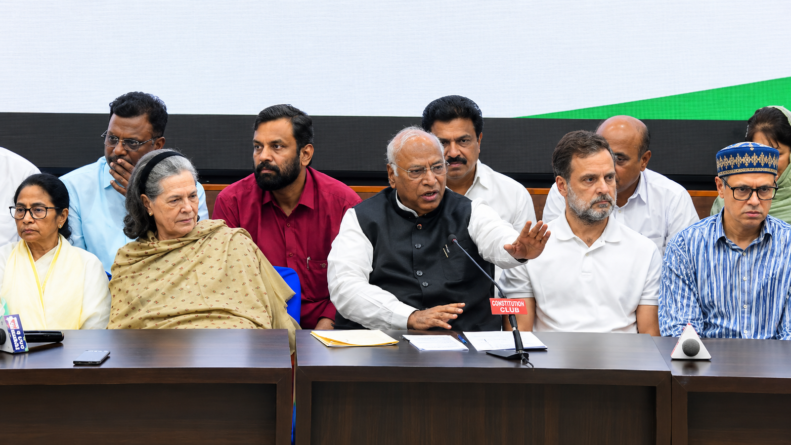 Sonia Gandhi's surprise arrival at the INDIA bloc meet triggered a last-minute seating shuffle before the Delhi press conference.